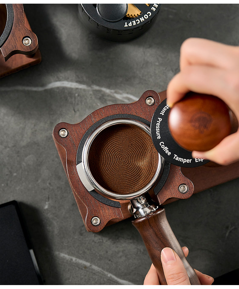 Bear tamper in use — tamping espresso puck